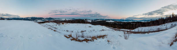 istock Evening twilight winter mountain ridge panorama 1065008774