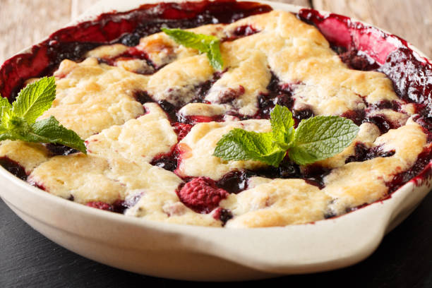istock cobbler mix of currants, raspberries and blueberries decorated with mint macro. horizontal 1065012948