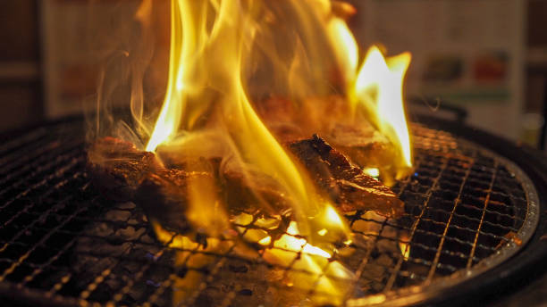 istock Closeup of Japanese grilled beef with a strong flame. 1065013116