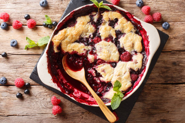 istock English cuisine: berry cobbler is decorated with mint closeup.  horizontal top view 1065013430