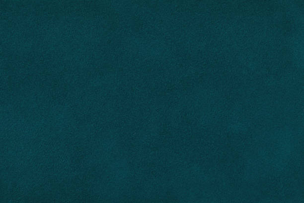 istock Dark green matt suede fabric closeup. Velvet texture. 1065015408
