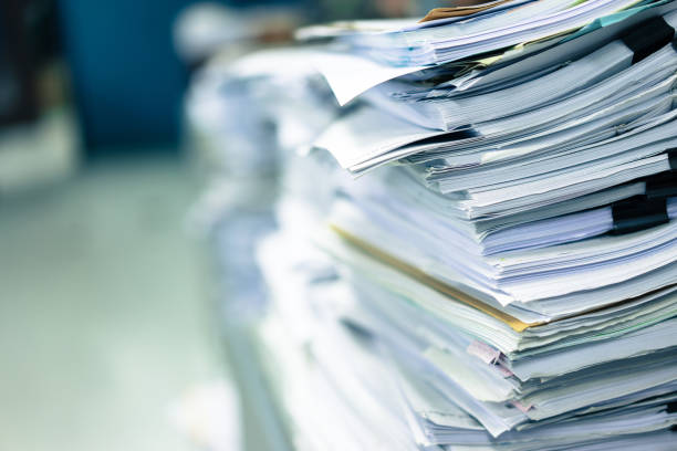 istock Many stacks of paper placed in the office. 1065015834