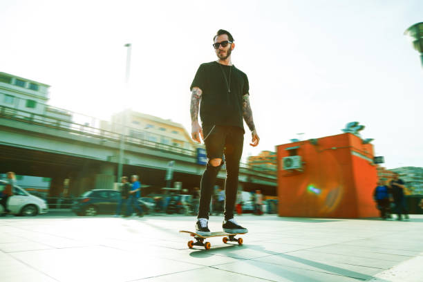 istock Young Men with his skateboard moving in the city 1065016032