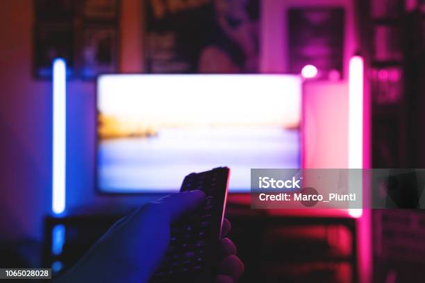 Binge Watching Tv Show Stock Photo - Download Image Now - Downloading, Television Industry, Television Set