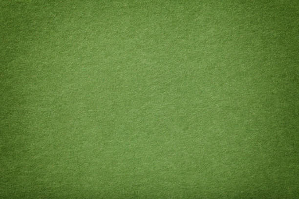 istock Light green matt suede fabric closeup. Velvet texture. 1065031324