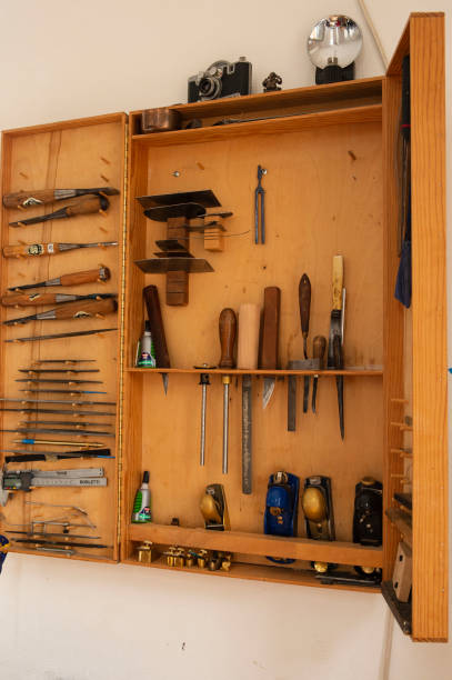istock Selection of carpentry tools in cabinet hanging on the wall 1065043162