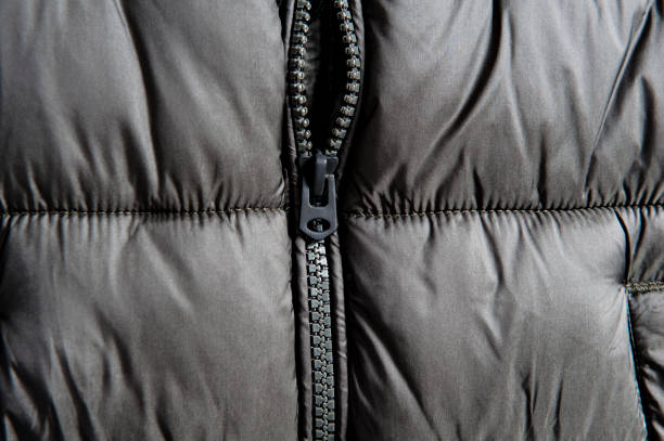 istock Grey down jacket zipper detail 1065054292