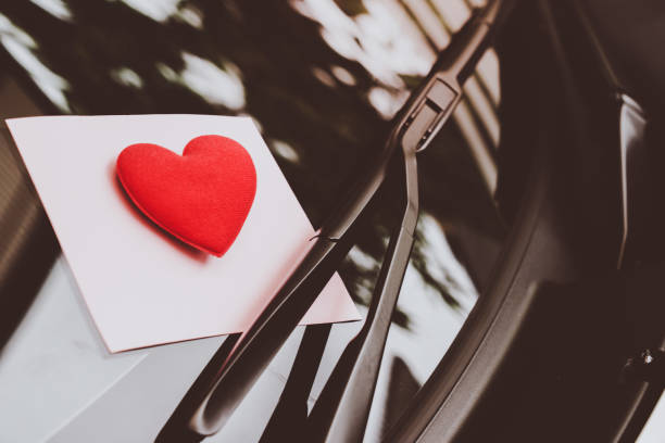 love letter heart on a sticky note under a windshield .vintage  color style