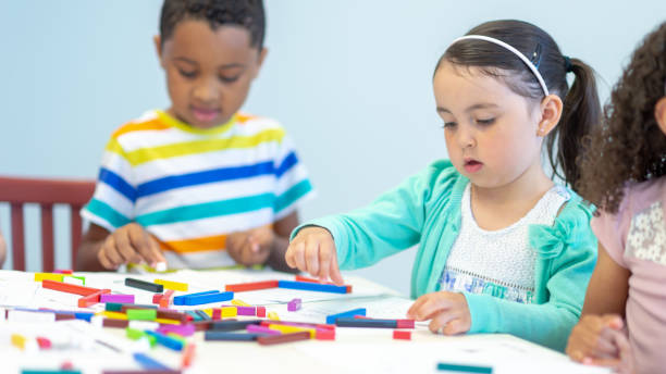 istock School children play with blocks 1065062900