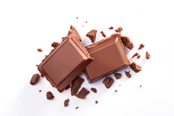 Pair of chocolate bars isolated on a white background viewed from above. Top view stock photo