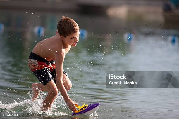 Summer Fun At The Lake Stock Photo - Download Image Now - Adult, Boys, Cheerful