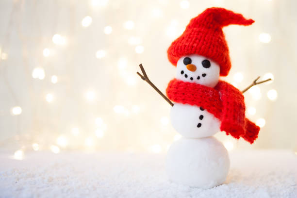 istock Festive Christmas background with snowman on the snow 1065079244
