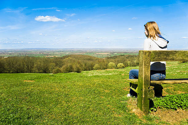 Young Woman Relaxing, Looking At A View stock photo