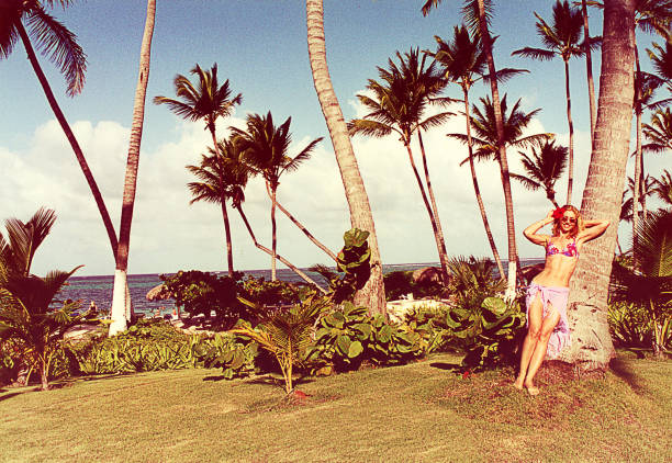 Analog bleached image of a young woman on a summer vacation