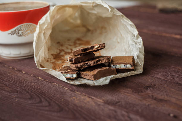 istock Dark chocolate bark with mixed fillingson wax paper 1065095578