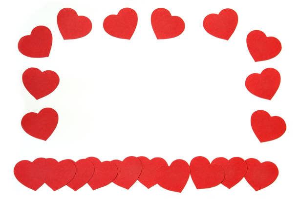 istock Frame of red hearts isolated on the white background. 1065111848