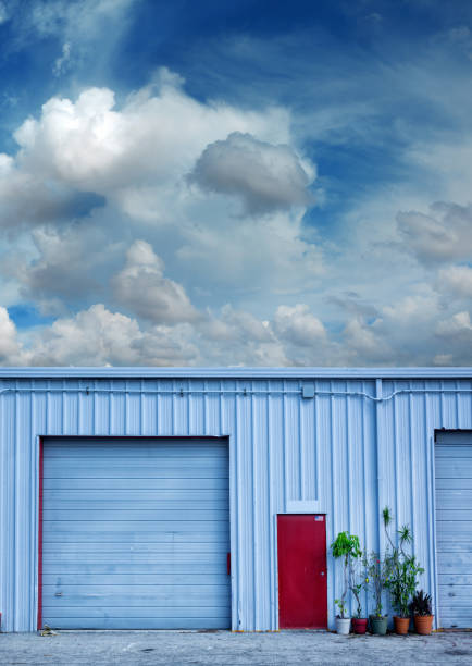 istock roll up garage door detail from warehouse building 1065112516
