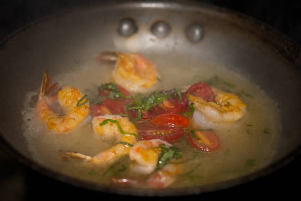 Shrimp frying in pan stock photo