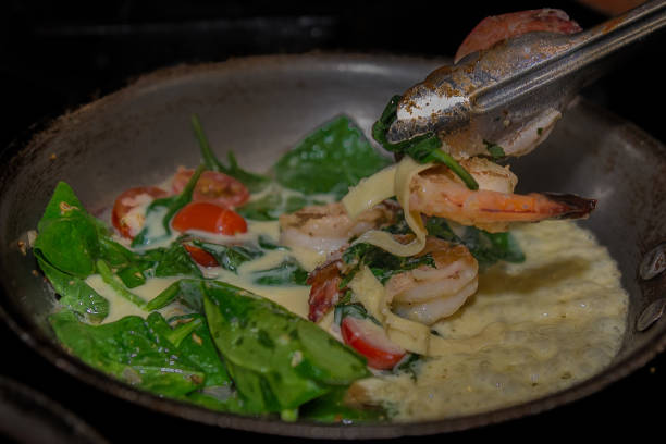 Shrimp frying in pan stock photo