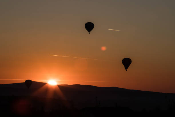 istock Balloon in the sunset 1065119154
