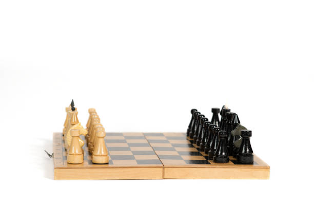 istock Chess on a chess Board isolated on the white background. 1065121952