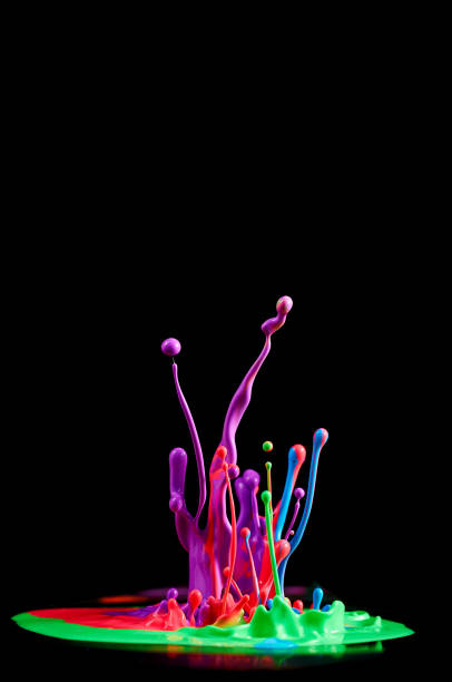 istock Dancing colored paint. Abstract sculpture dye. Splash of ink on a black background 1065125872