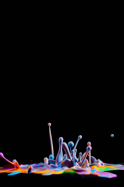 istock Dancing colored paint. Abstract sculpture dye. Splash of ink on a black background 1065125944
