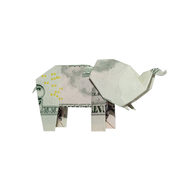 istock Money Origami ELEPHANT Right Side Folded with Real FIVE Dollar Bill Isolated on White Background 1065134174