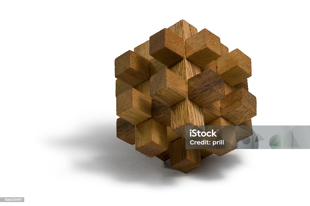 wooden 3D puzzle studio photography of a wooden 3D-puzzle in white back Accuracy Stock Photo