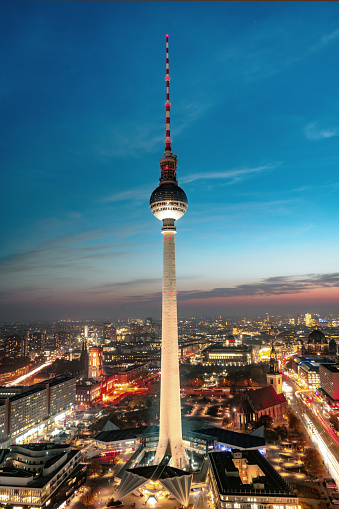 view on illuminated berlin skyline with tv-tower at sunset hour