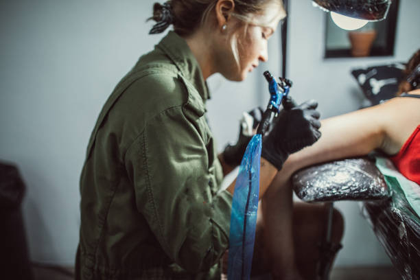 istock Busy day In tattoo studio 1065138298