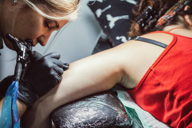 istock Woman has a new tattoo 1065139454