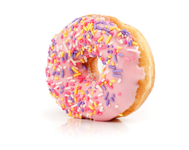 istock Pink Iced Doughnut covered in sprinkles 106514547