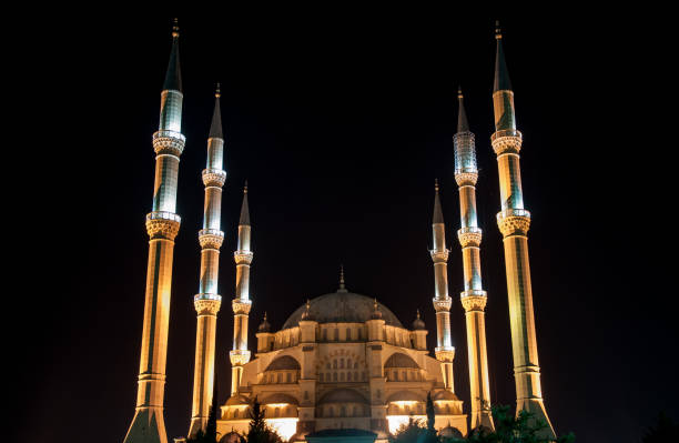 istock The close up view mosque at night, city background. 1065145926