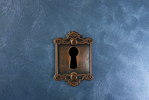 Retro lock on blue textured background