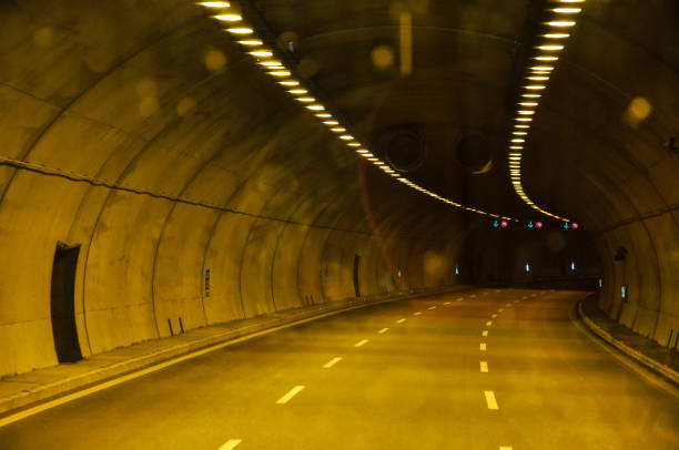 istock Road tunnel and lights. 1065151422
