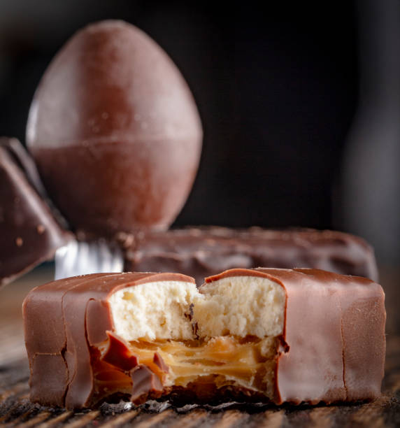 istock Chocolate candies on a wooden background. Close-up 1065154574