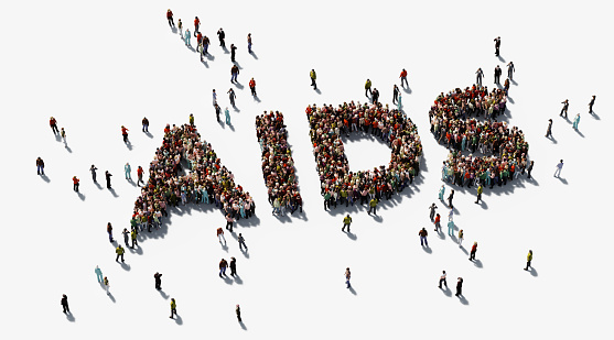Human crowd forming  AIDS text on white background. Horizontal  composition with copy space. Directly above. Clipping path is included. AIDS awareness concept.