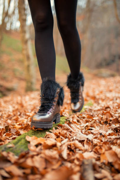 istock Young woman in forest at autumn 1065159496