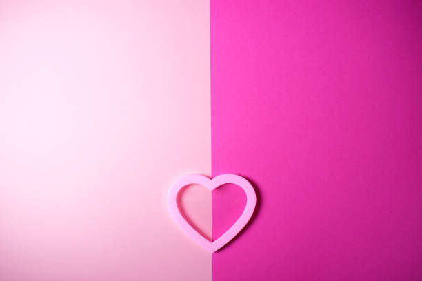 istock Pink heart on the double colored background. 1065164856