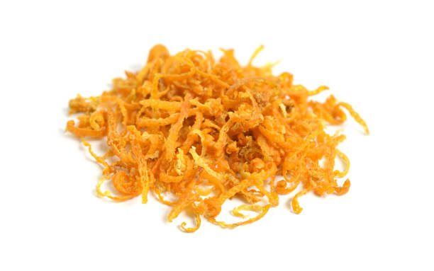 istock Dried Orange Zest. Isolated on white background 1065166010