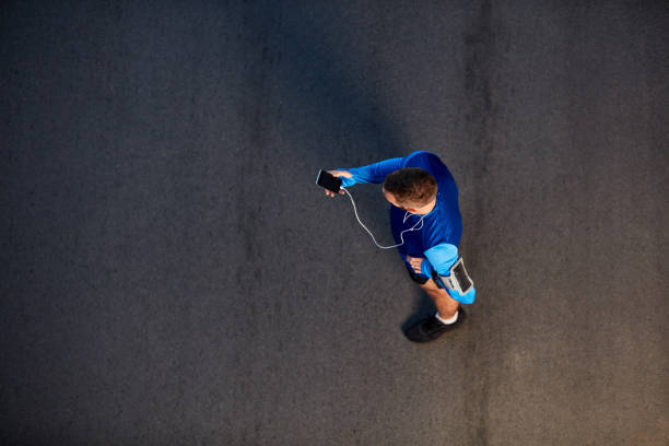 istock Top view of runner standing on the street. 1065172400