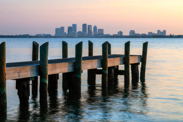 Tampa Skyline as viewed at sunset from a small dock across Tampa Bay