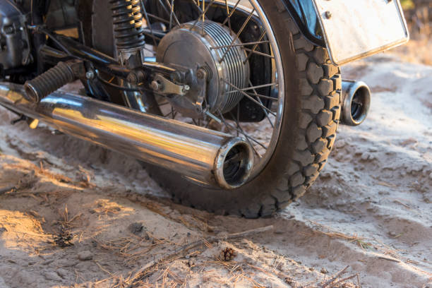 istock Motorcycle wheel on a sandy road, close-up 1065176204