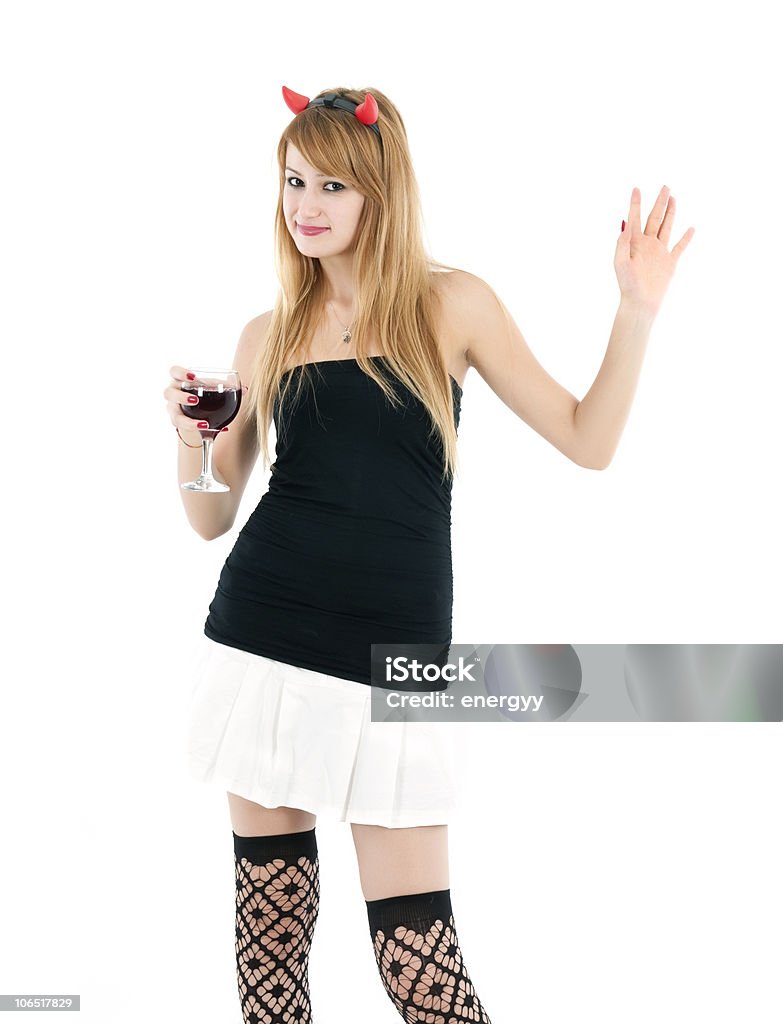 Giovane donna bere vino rosso in una parte - Foto stock royalty-free di 2012