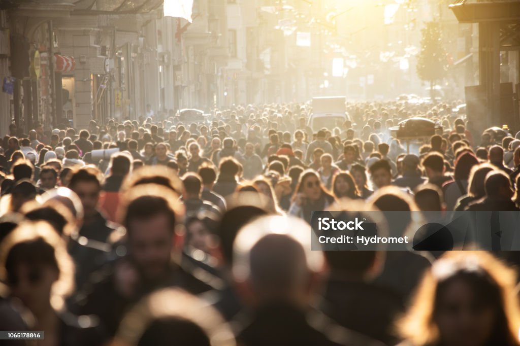 Blurred crowd of unrecognizable at the street Crowd of People Stock Photo