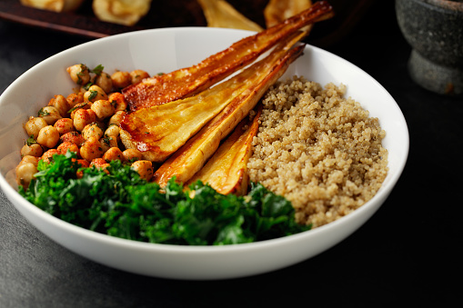 Home made freshness roasted parsnip with honey, quinoa,chickpea with Paprika and freshness kale bowl.