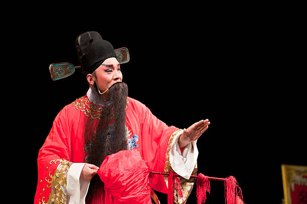 china opera man in red  chinese opera makeup stock pictures, royalty-free photos & images