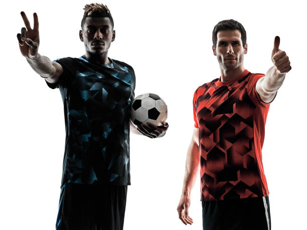 istock soccer players men isolated silhouette white background 1065184216