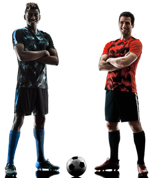 istock soccer players men isolated silhouette white background 1065184410